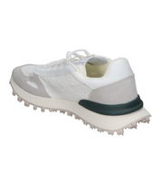 Deportivas planas para mujer SKYDIVA HYPE en color blanco, vista diagonal talón