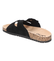 Sandalias planas destalonadas para mujer SKYDIVA RT en color negro, vista diagonal talón